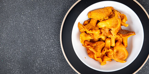 mushroom chanterelle fresh food tasty mushrooms snack on the table copy space food background rustic top view