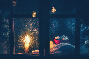 Christmas, winter composition. red mug with cocoa and marshmallows and Candles