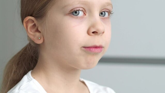 Expanding or narrowing the jaw using removable orthodontic appliances. Kid girl smiling with orthodontic plate. Teeth alignment, retainer orthodontic correction