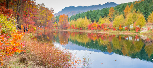 Panorama of the Reflected Color Lake in the Laobiangou scenic area near Benxi, China - obrazy, fototapety, plakaty