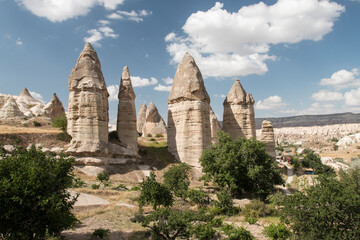 enormous fairy chimneys in Sword Valley, near Göreme, Cappadocia, Turkey - obrazy, fototapety, plakaty