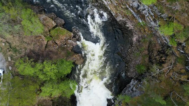 River gorge in Norwegian forest and mountain area, Lærdal River filmed by drone in 4K.