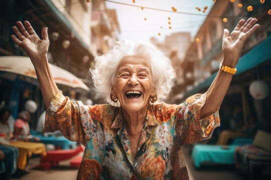 A happy elderly woman raises her hands to her waist.