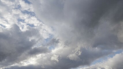 Obraz premium Light in the Dark and Dramatic Storm Clouds background