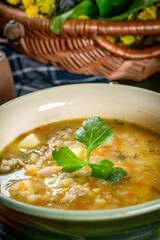 Barley soup with vegetables and chicken.