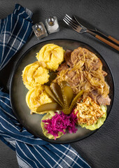 Pork tenderloin stewed in onions.