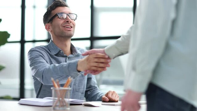 handshake and meeting in teamwork for partnership or collaboration in boardroom.