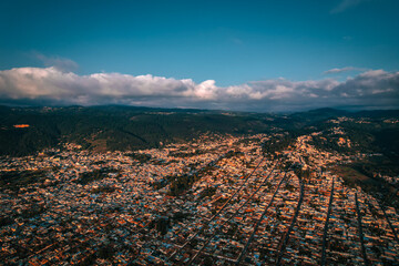 San Cristobal de las Casas hills glow in twilight, a tranquil Chiapas landscape at sunset.