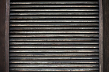 Wooden stripes pattern. Ventilation grille texture. Industrial hardwood bars. Grunge grid lines. Brown wood frame background.