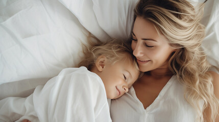 Cute little blond girl sleeping with mother on bed, white bedsheets and cozy room, closeup portrait