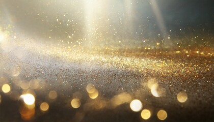 background of abstract gold and silver glitter lights defocused
