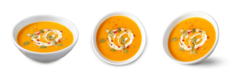 Pumpkin Soup, Tasty Homemade Pumpkin, Sweet Potato or Carrot Soup in a Bowl on White Background
