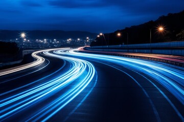 Blue curve car lights at night with long exposure