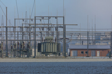 Würgassen, Germany - 12/17/2022: Substation and transformers at the decommissioned Würgassen nuclear power plant in the winter