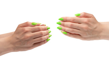 Hand of a woman with green naols hold some tiny or thin object.