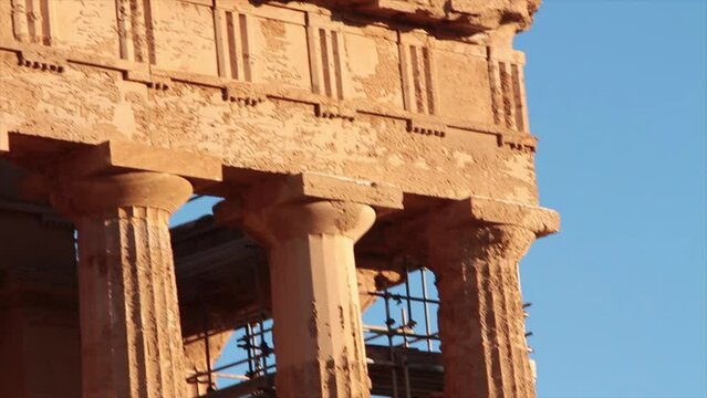 agrigento sicily italy ancient temple of concordia pillars close up on top pan left to right and pillars pan right to left