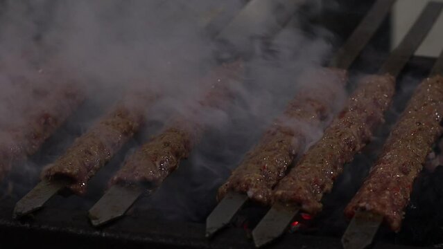 Grilling Adana Kebab on Street at Night