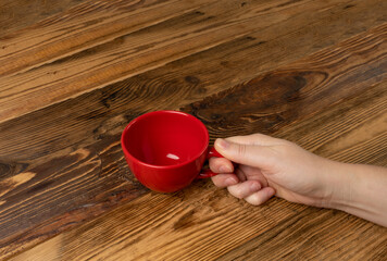 Hand Holds Cup, Empty Red Cup in Hands, Coffee Mug, Teacup, Hot Beverage Mockup