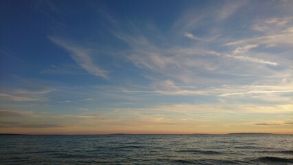 Day at sea,  blue sea, white clouds