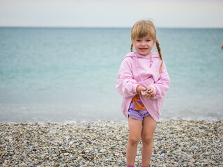 girl enjoying holiday on the beach