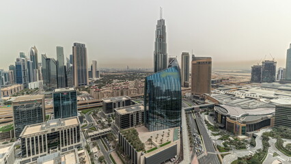 Panorama showing futuristic Dubai Downtown and financial district skyline aerial timelapse.