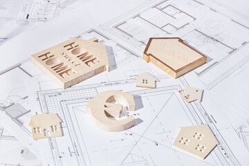 House building project concept with plans