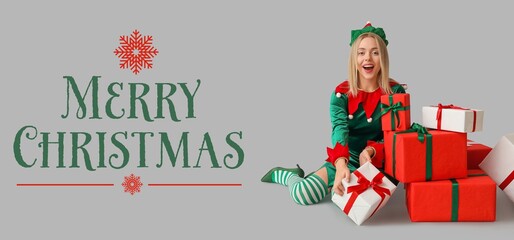 Greeting banner with young woman in elf costume and many Christmas gifts