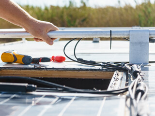 RV solar panel installation. Caravan roof repair