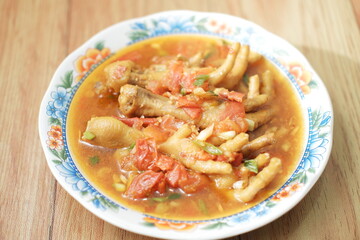 Chicken feet seasoned with vegetables.