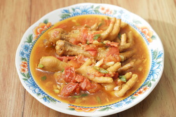 Chicken feet seasoned with vegetables.