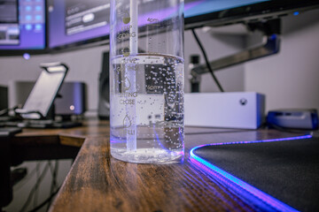 Crystal Clear Water in a Bottle with Bubbles and Condensation - Hydration Concept in a Refreshing Close-Up Shot