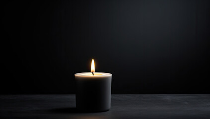 Elegance in Simplicity: A Captivating Display of Votive Candle Illumination Against a Stylish Black Canvas