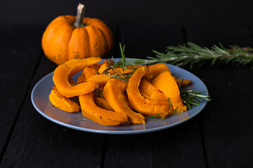 Baked pumpkin with fresh rosemary