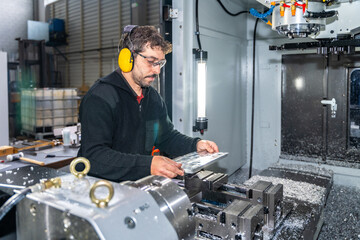 Engineer working with a milling cnc machine