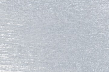 Retro gray light background with the structure of an old wooden board, contrasting black text fits
