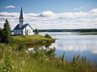 Fototapeta na wymiar Church near the river lake, lush landscape backgrounds, romantic riverscapes, white and blue.