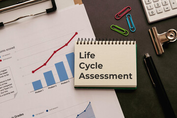 There is notebook with the word Life Cycle Assessment. It is as an eye-catching image.