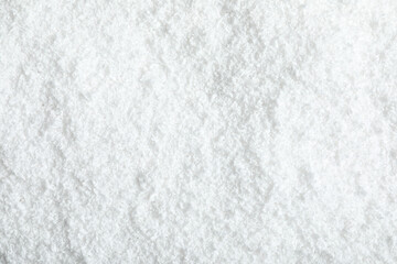 Pile of white snow as background, top view