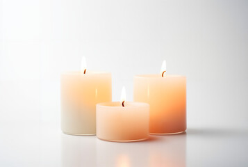 Fototapeta na wymiar Candles symbolizing romance against a white background