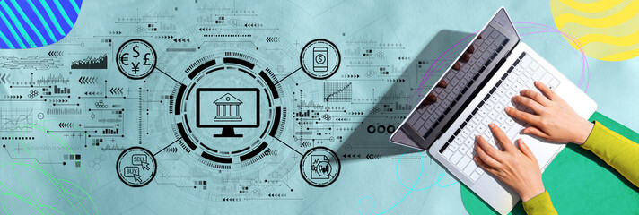 Fintech theme with person using a laptop computer