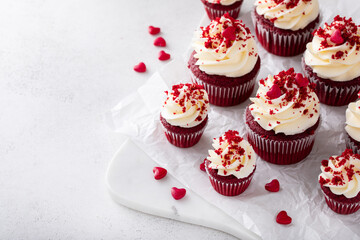 Red velvet cupcakes with cream cheese frosting for Valentines day
