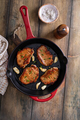 Pork chops cooked in a cast iron pan