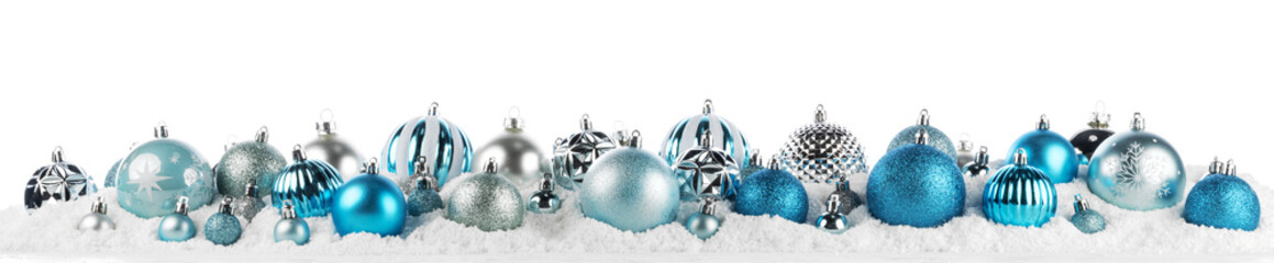 blue and silver christmas balls long frame on snow