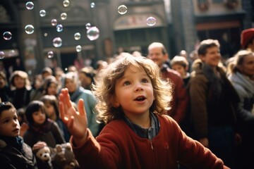 Boy with bubbles in crowd