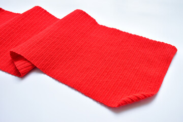 wavy of red wool knitted yarn texture, woolen fabric on white background
