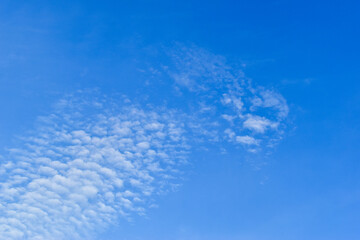 beautiful blue sky and white fluffy group of clouds in the morning, natural background
