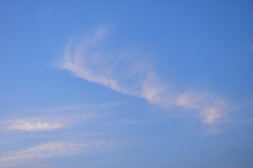 beautiful blue sky and cloud with golden ray sunrise in the morning, natural background