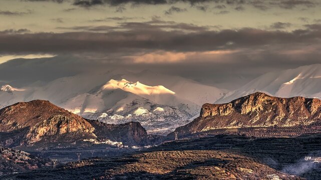 HDR, White Mountains in Winter, Lefka Ori, Dramatic Light, Cloudy Sky, Range of Hills, Village, Kissamos, Chania Province, Crete, Greece, Europe