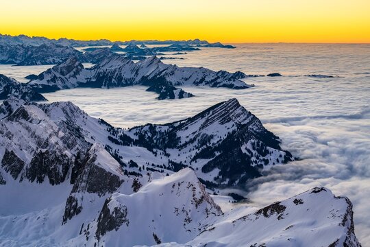 View from the Saentis to the mountains of Central Switzerland, mountain peaks rising from the sea of fog, evening mood, Alpstein, Appenzell, Switzerland, Europe