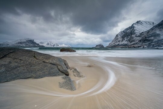 Coast with islands and mountains, Haukland beach, Vestvagoya, Lofoten, Norway, Europe